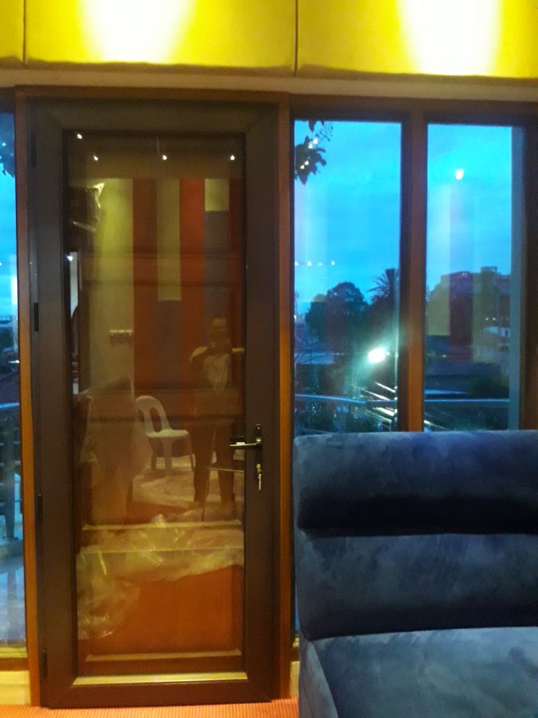 menjual pintu kombinasi kayu dan upvc
