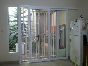 kombinasi pintu tralis besi dan pintu upvc