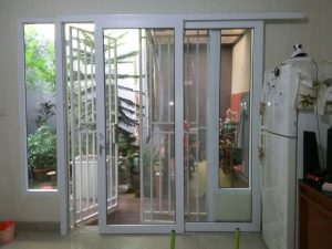 kombinasi pintu tralis besi dan pintu upvc