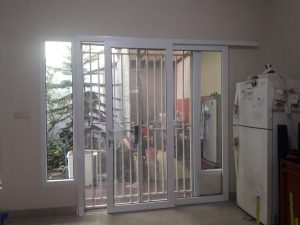 kombinasi pintu tralis besi dan pintu upvc