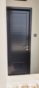 PINTU SWING ALUMUNIUM SPANDREL DI SURABAYA