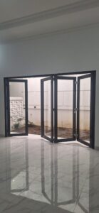 Pintu Lipat uPVC Hitam Banjarmasin: Elegan, Kuat, dan Tahan Cuaca