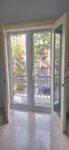 Pintu Double Swing UPVC: Solusi Premium untuk Rumah Modern yang Elegan dan Aman