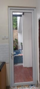 Jual Pintu Swing UPVC Kaca Banjarmasin | Kreasi Megah Konstruksi